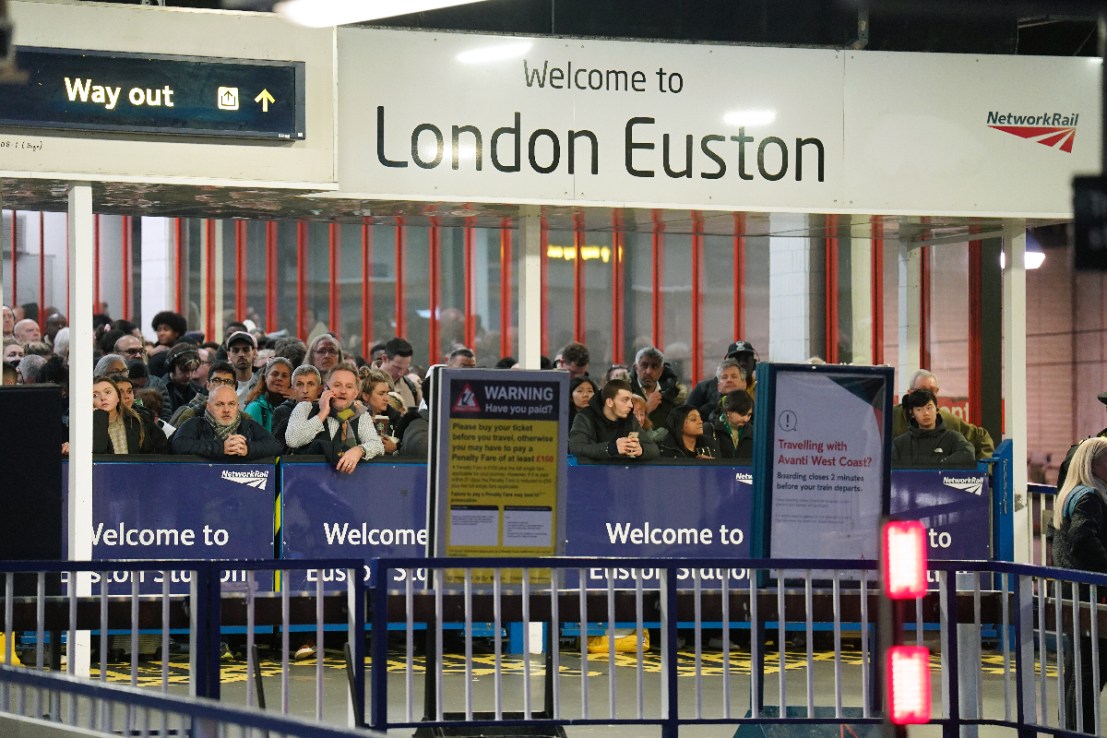 Passengers at Euston Station, London, as travellers get an early start to their Christmas journeys ahead of the weekend. Strong winds are disrupting the start of the Christmas getaway for millions of people. Train services across large parts of Britain are being affected by Storm Pia as fallen trees and other debris damage overhead power lines and block tracks. Picture date: Thursday December 21, 2023. PA Photo. See PA story TRANSPORT Getaway. Photo credit should read: James Manning/PA Wire