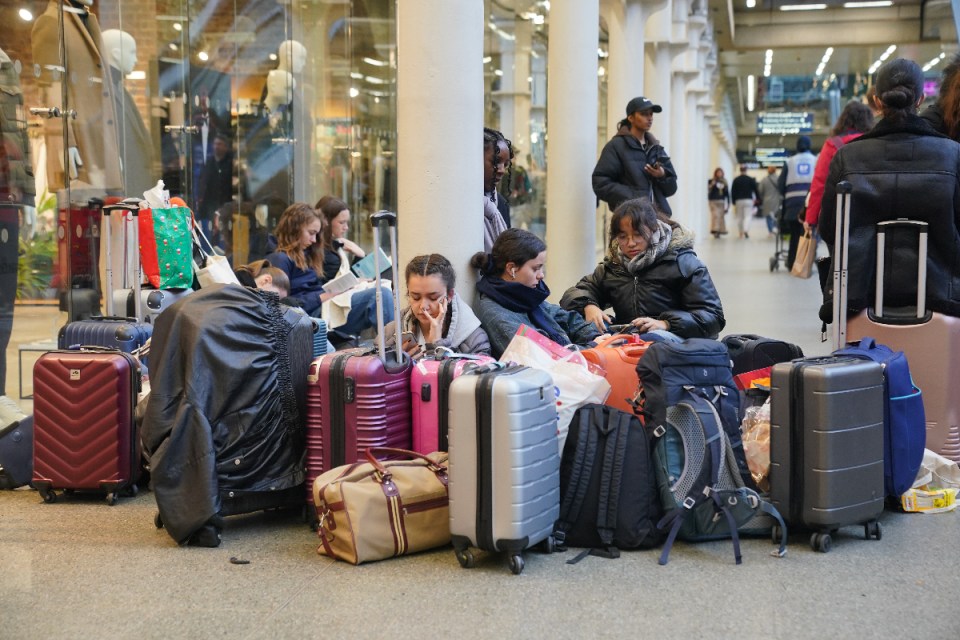 Passengers at St Pancras International station, London, as Christmas getaway chaos is expected to continue as the backlog from the suspension of cross-Channel rail services begins to clear and the weather remains unsettled