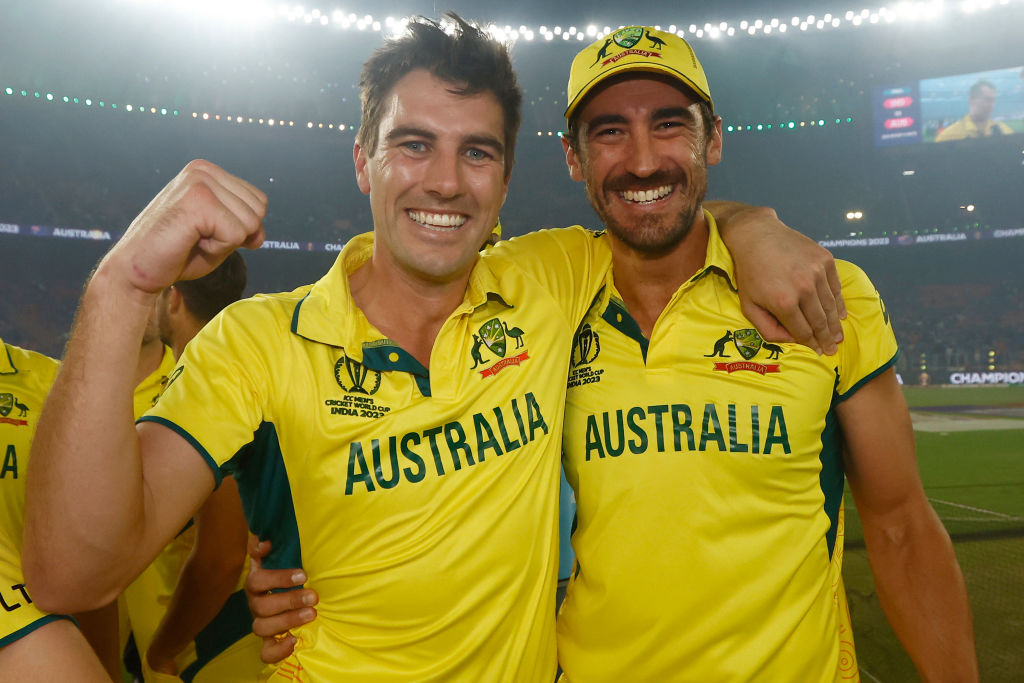 AHMEDABAD, INDIA - NOVEMBER 19: Pat Cummins and Mitchell Starc of Australia celebrates after the ICC Men's Cricket World Cup India 2023 Final between India and Australia at Narendra Modi Stadium on November 19, 2023 in Ahmedabad, India. (Photo by Darrian Traynor-ICC/ICC via Getty Images)