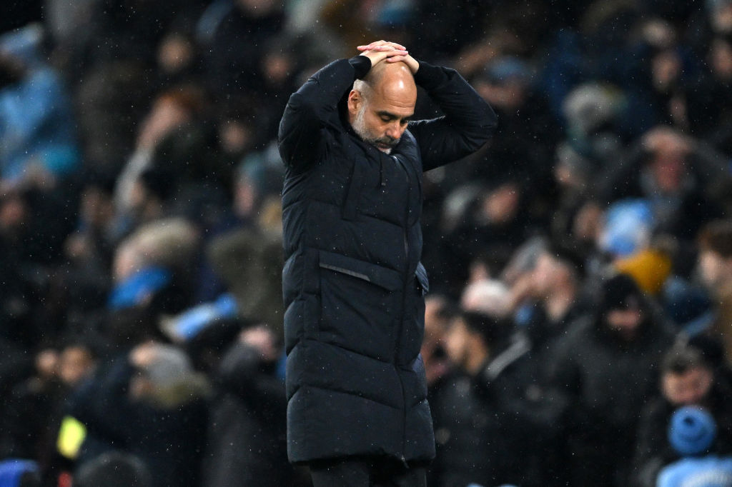 MANCHESTER, ENGLAND - DECEMBER 03: Pep Guardiola, Manager of Manchester City, reacts during the Premier League match between Manchester City and Tottenham Hotspur at Etihad Stadium on December 03, 2023 in Manchester, England. (Photo by Shaun Botterill/Getty Images)