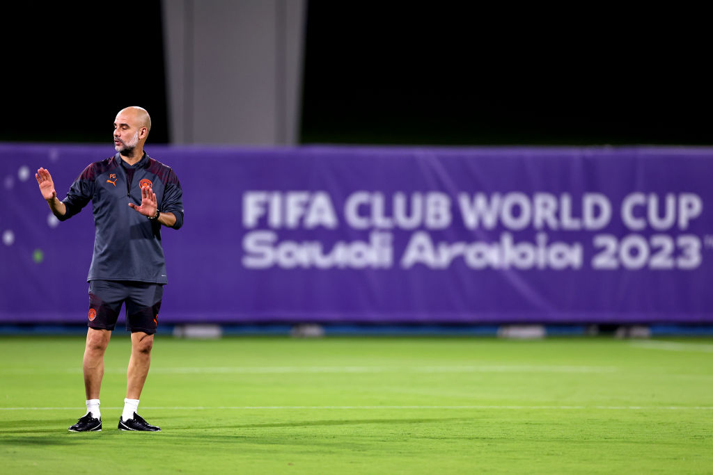 JEDDAH, SAUDI ARABIA - DECEMBER 18: Pep Guardiola the head coach / manager of Manchester City looks on during the MD-1 training session prior to the FIFA Club World Cup Semi-Final match between Urawa Reds and Manchester City at King Abdullah Sports City on December 18, 2023 in Jeddah, Saudi Arabia. (Photo by Robbie Jay Barratt - AMA/Getty Images)
