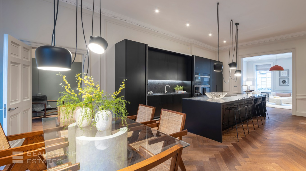 A large modern kitchen and dining area is the centrepiece of this  Grade II-listed  apartment in Devonshire Place that dates back to circa 1790