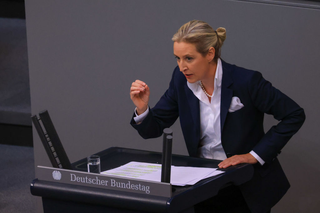 Alice Weidel, co-leader of Alternative for Germany (AfD), addresses lawmakers, after Olaf Scholz, Germany's chancellor made a statement on the Federal Constitutional Court's ruling on the 60 billion ($65.2 billion) climate funding, at the Bundestag in Berlin, Germany, on Tuesday, Nov. 28, 2023. Scholz promised that his government will forge ahead with investments needed to modernize the economy and maintain international competitiveness even after this month's court ruling upended its budget planning. Photographer: Krisztian Bocsi/Bloomberg via Getty Images