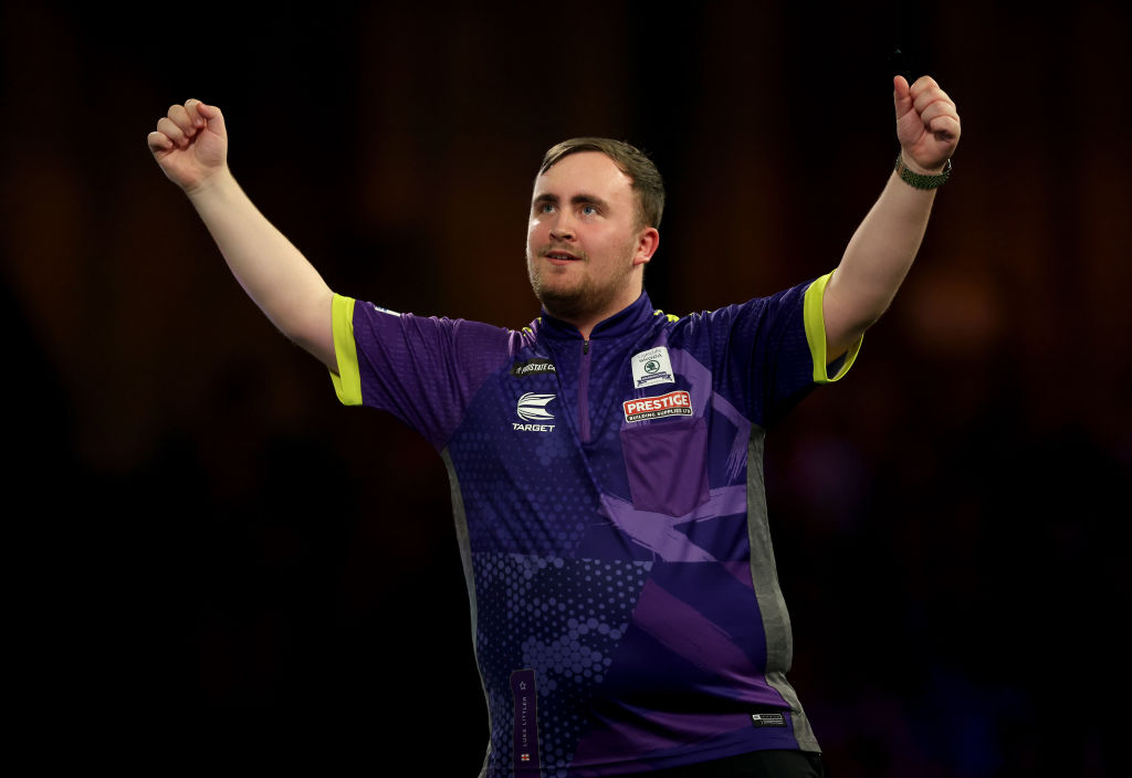 LONDON, ENGLAND - JANUARY 02: Luke Littler of England celebrates winning his semi final match against Rob Cross of England on day 15 of the 2023/24 Paddy Power World Darts Championship at Alexandra Palace on January 02, 2024 in London, England. (Photo by Tom Dulat/Getty Images)