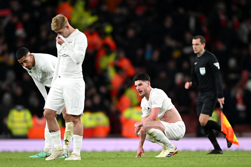 LONDON, ENGLAND - JANUARY 07: Declan Rice of Arsenal looks dejected after the team's defeat in the Emirates FA Cup Third Round match between Arsenal and Liverpool at Emirates Stadium on January 07, 2024 in London, England. Arsenal wear an all-white kit at home, for the first time in the club's history, in support of the 'No More Red' campaign against knife crime and youth violence. (Photo by Shaun Botterill/Getty Images)