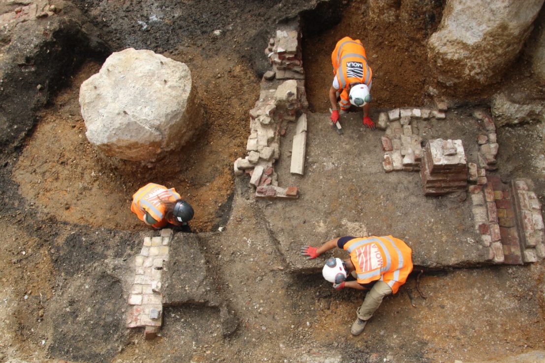Archaeologists excavate the remains of building foundations at Holborn Viaduct ╕MOLA