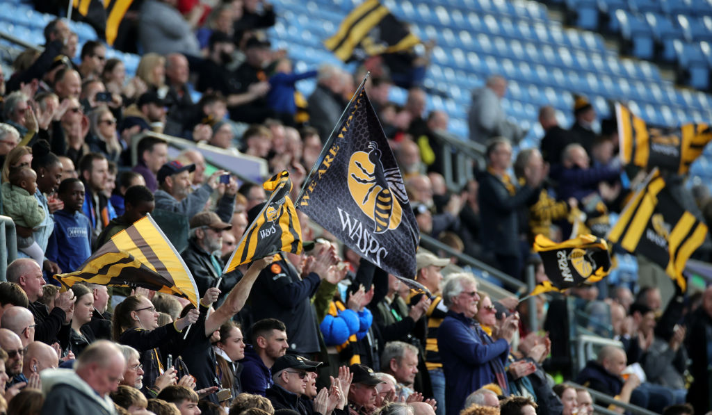 COVENTRY, ENGLAND - OCTOBER 09:  Wasps fans wave their flags during the Gallagher Premiership Rugby match between Wasps and Northampton Saints at The Coventry Building Society Arena on October 09, 2022 in Coventry, England. (Photo by David Rogers/Getty Images)