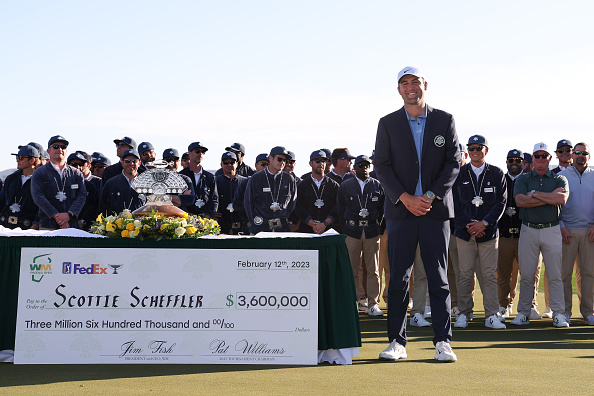 SCOTTSDALE, ARIZONA - FEBRUARY 12: Scottie Scheffler of the United States smiles at the trophy ceremony during the final round of the WM Phoenix Open at TPC Scottsdale on February 12, 2023 in Scottsdale, Arizona. (Photo by Maddie Meyer/Getty Images)
