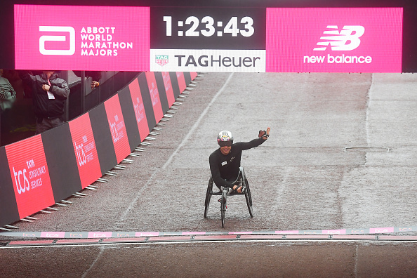LONDON, ENGLAND - APRIL 23: Marcel Hug of Switzerland crosses the finish line to win the Men's Wheelchair Marathon during the 2023 TCS London Marathon on April 23, 2023 in London, England. (Photo by Alex Davidson/Getty Images)