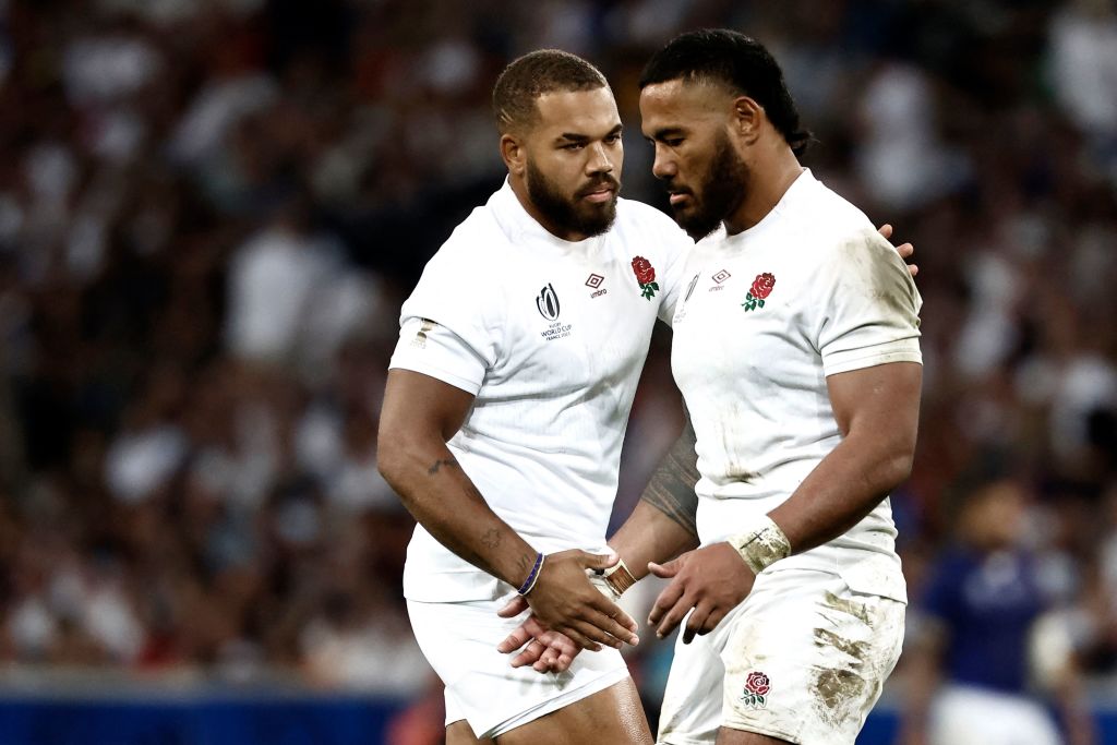 England's centre Manu Tuilagi (R) and England's centre Ollie Lawrence react during the France 2023 Rugby World Cup Pool D match between England and Samoa at the Stade Pierre-Mauroy in Villeneuve-d'Ascq, near Lille, northern France on October 7, 2023. (Photo by Sameer Al-Doumy / AFP) (Photo by SAMEER AL-DOUMY/AFP via Getty Images)