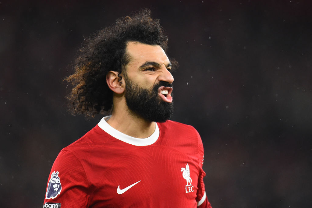 Liverpool's Egyptian striker #11 Mohamed Salah reacts during the English Premier League football match between Liverpool and Newcastle United at Anfield in Liverpool, north west England on January 1, 2024. (Photo by PETER POWELL / AFP) / RESTRICTED TO EDITORIAL USE. No use with unauthorized audio, video, data, fixture lists, club/league logos or 'live' services. Online in-match use limited to 120 images. An additional 40 images may be used in extra time. No video emulation. Social media in-match use limited to 120 images. An additional 40 images may be used in extra time. No use in betting publications, games or single club/league/player publications. /  (Photo by PETER POWELL/AFP via Getty Images)
