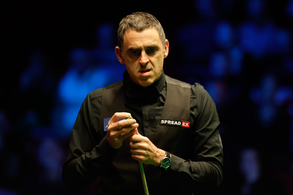 LEICESTER, ENGLAND - JANUARY 20: Ronnie O'Sullivan of England chalks the cue in the Semi-final match against Ding Junhui of China on day 6 of the 2024 Spreadex World Grand Prix at Morningside Arena on January 20, 2024 in Leicester, England. (Photo by Tai Chengzhe/VCG via Getty Images)
