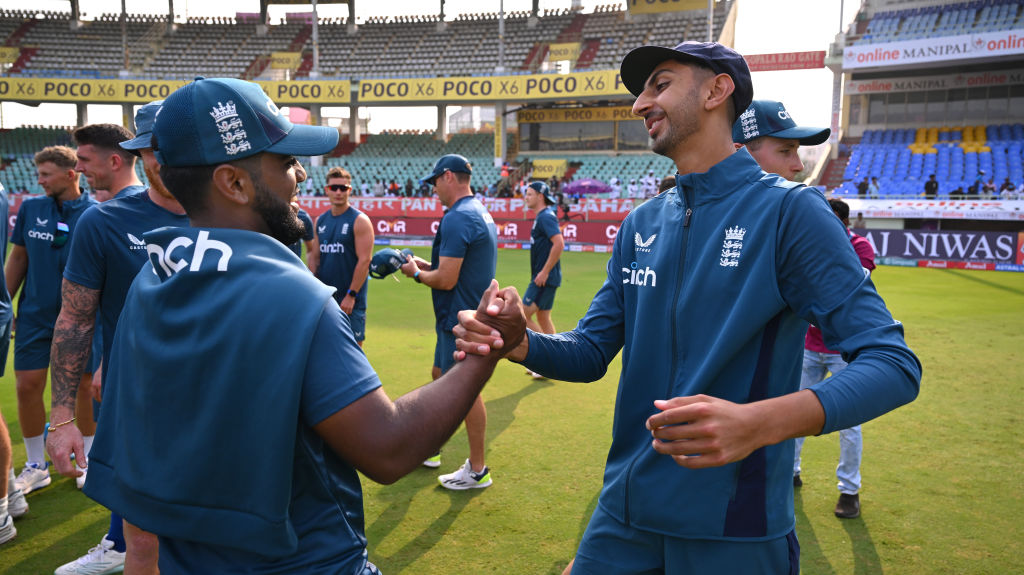 VISAKHAPATNAM, INDIA - FEBRUARY 02: Debutant Shoaib Bashir is congratulated by Rehan Ahmed prior to day one of the 2nd Test Match between India  and England at ACA-VDCA Stadium on February 02, 2024 in Visakhapatnam, India. (Photo by Stu Forster/Getty Images)