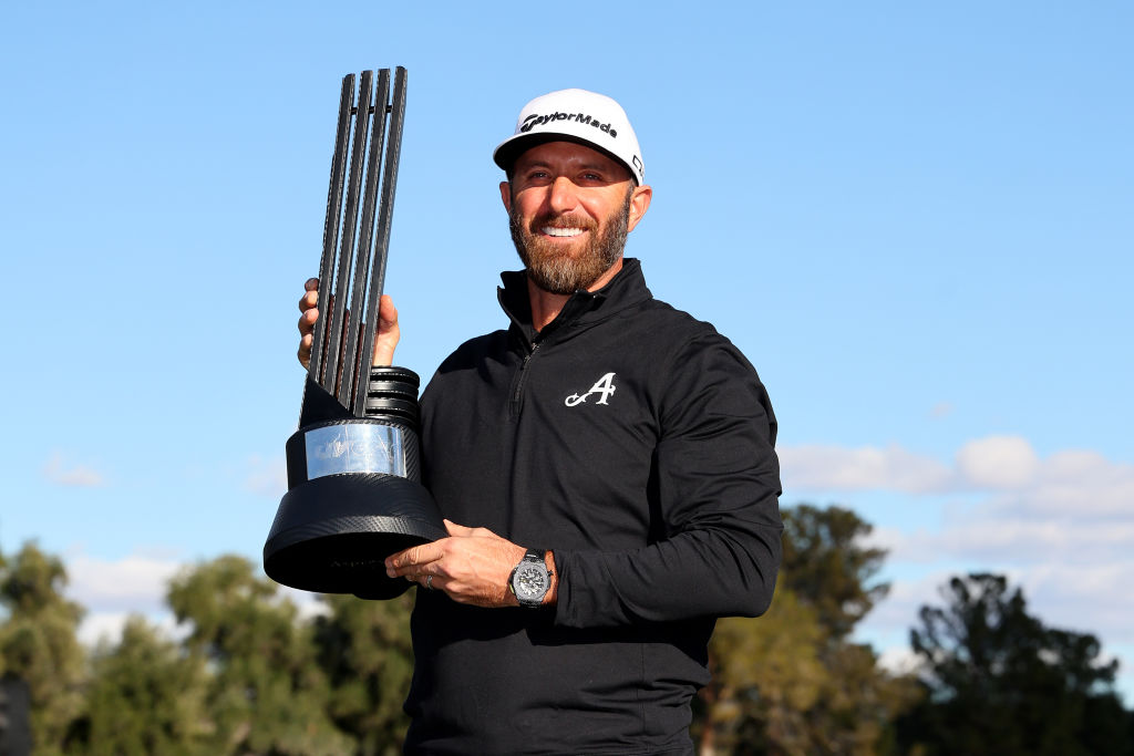 LAS VEGAS, NEVADA - FEBRUARY 10: Captain Dustin Johnson of 4Aces GC poses with the individual trophy after winning during day three of the LIV Golf Invitational - Las Vegas at Las Vegas Country Club on February 10, 2024 in Las Vegas, Nevada. (Photo by Michael Reaves/Getty Images)