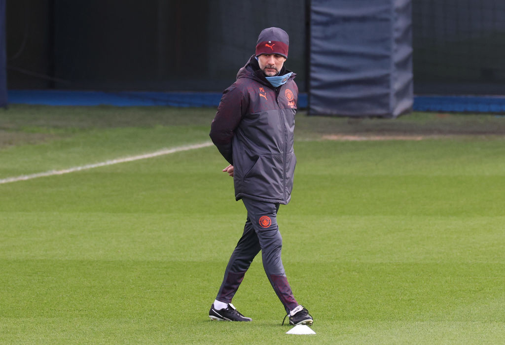 MANCHESTER, ENGLAND - FEBRUARY 12: Pep Guardiola the manager of Manchester City looks on during a training session at Etihad Campus ahead of their UEFA Champions League match against FC Copenhagen on February 12, 2024 in Manchester, England. (Photo by Alex Livesey - Danehouse/Getty Images)