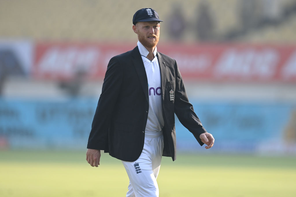 RAJKOT, INDIA - FEBRUARY 15: England captain Ben Stokes wearing his 100th test cap ahead of day one of the 3rd Test Match between India  and England at Saurashtra Cricket Association Stadium on February 15, 2024 in Rajkot, India. (Photo by Gareth Copley/Getty Images)