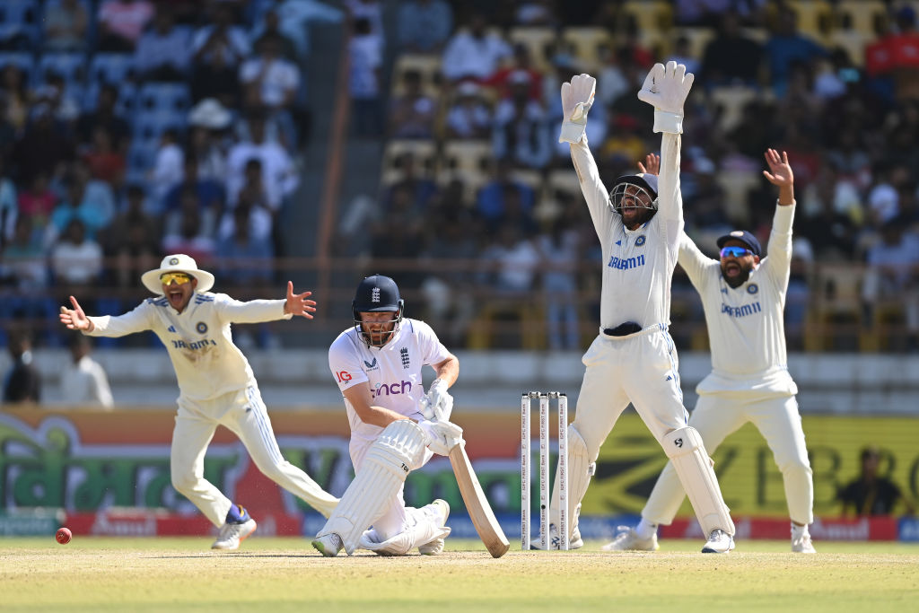 RAJKOT, INDIA - FEBRUARY 18: India wicketkeeper Dhruv Jurel and team mates appeal with success for the wicket of Jonny Bairstow, lbw to Ravindra Jadeja (not pictured)  during day four of the 3rd Test Match between India  and England at Saurashtra Cricket Association Stadium on February 18, 2024 in Rajkot, India. (Photo by Gareth Copley/Getty Images)