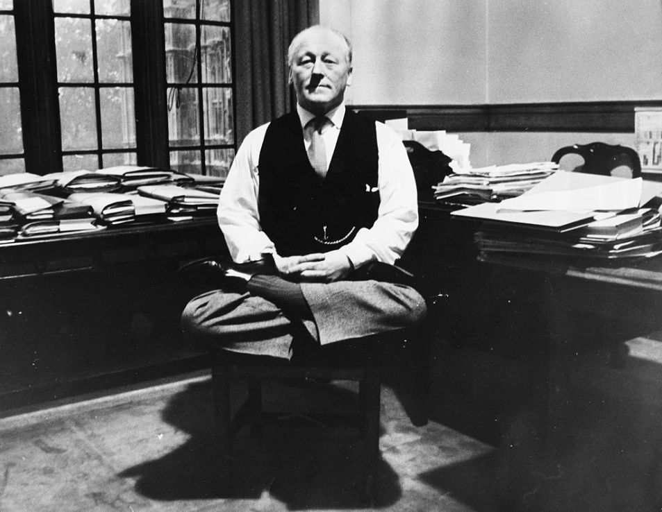 Ahead of the curve British politician Sir Edward Mallalieu practicing yoga in his office, October 28th 1964. (Photo by Keystone/Hulton Archive/Getty Images)
