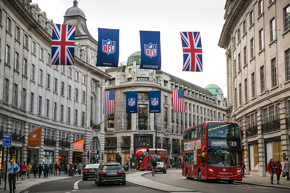 LONDON, ENGLAND - SEPTEMBER 12:  Union Jack and American flags are draped across Regent Street to celebrate the National Football League's upcoming season of American football games in this historic city on September 12, 2017, in London, England. Great Britain's move toward "Brexit," or the departure from the European Union, has not deterred the late summer crowds visiting city museums, hotels, and other important tourist attractions. (Photo by George Rose/Getty Images)