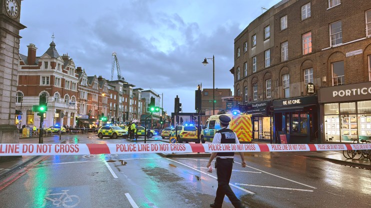 Photo taken with permission from social media site X, formerly Twitter, posted by Jake Warren of police at the scene of a shooting in Clapham, London. PA: Jake Warren