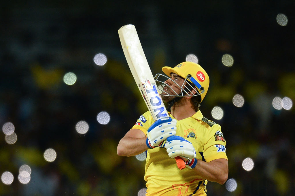 Chennai Super Kings' captain Mahendra Singh Dhoni watches the ball after playing a shot during the Indian Premier League (IPL) Twenty20 cricket match between Chennai Super Kings and Lucknow Super Giants at the MA Chidambaram Stadium in Chennai on April 3, 2023. (Photo by R.Satish BABU / AFP) / IMAGE RESTRICTED TO EDITORIAL USE - STRICTLY NO COMMERCIAL USE (Photo by R.SATISH BABU/AFP via Getty Images)