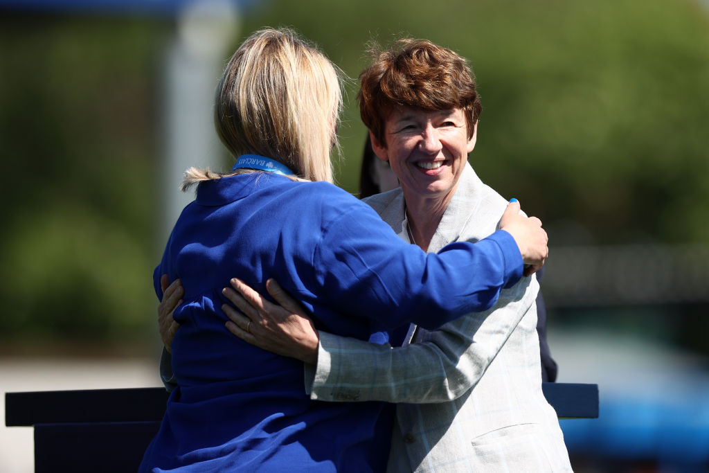 KINGSTON UPON THAMES, ENGLAND - MAY 08: Emma Hayes, Manager of Chelsea embraces Dawn Airey as she collects her medal during the Barclays FA Women's Super League match between Chelsea Women and Manchester United Women at Kingsmeadow on May 08, 2022 in Kingston upon Thames, England. (Photo by Naomi Baker - The FA/The FA via Getty Images)