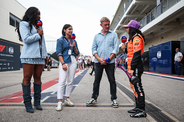 AUSTIN, TEXAS - OCTOBER 21: Race winner Hamda Al Qubaisi of United Arab Emirates and MP Motorsport (4) talks with Naomi Schiff, Jamie Chadwick and Simon Lazenby in the Paddock after F1 Academy Series Round 7:Austin race 2 at Circuit of The Americas on October 21, 2023 in Austin, Texas. (Photo by Jared C. Tilton - Formula 1/Formula 1 via Getty Images)