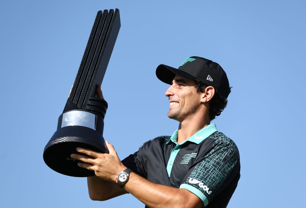 JEDDAH, SAUDI ARABIA - MARCH 03: Joaquin Niemann of Torque GC poses for a photo with his trophy after winning the LIV Golf Invitational - Jeddah at Royal Greens Golf & Country Club on March 03, 2024 in King Abdullah Economic City , Saudi Arabia. (Photo by Francois Nel/Getty Images)
