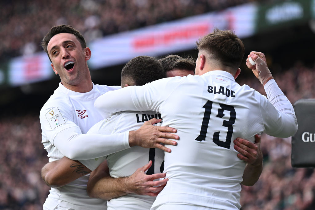 LONDON, ENGLAND - MARCH 09: Alex Mitchell and Henry Slade of England embrace try scorer Ollie Lawrence during the Guinness Six Nations 2024 match between England and Ireland at Twickenham Stadium on March 09, 2024 in London, England. (Photo by Mike Hewitt/Getty Images)