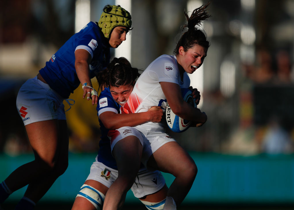 PARMA, ITALY - MARCH 24: Helena Rowland of England is tackled by Alessandra Frangipani of Italy during the Guinness Women's Six Nations 2024 match between Italy and England at Stadio Sergio Lanfranchi on March 24, 2024 in Parma, Italy. (Photo by Timothy Rogers/Getty Images)