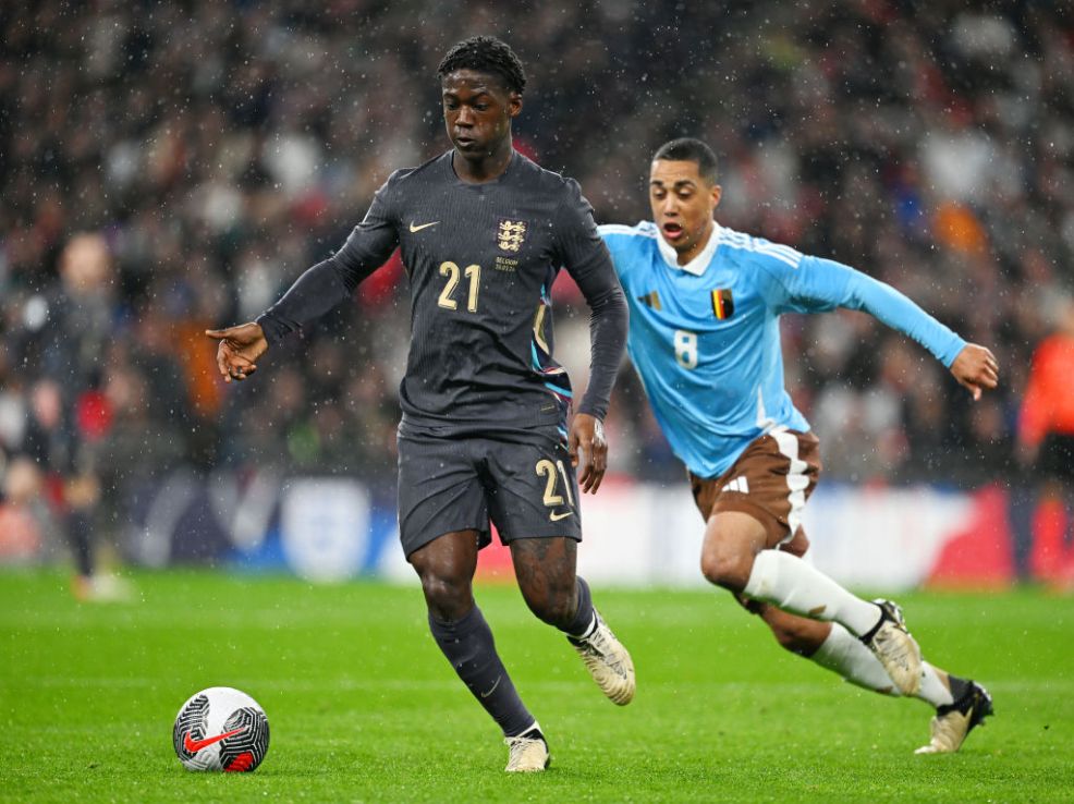 LONDON, ENGLAND - MARCH 26: Kobbie Mainoo of England runs with the ball during the international friendly match between England and Belgium at Wembley Stadium on March 26, 2024 in London, England. (Photo by Michael Regan - The FA/The FA via Getty Images)