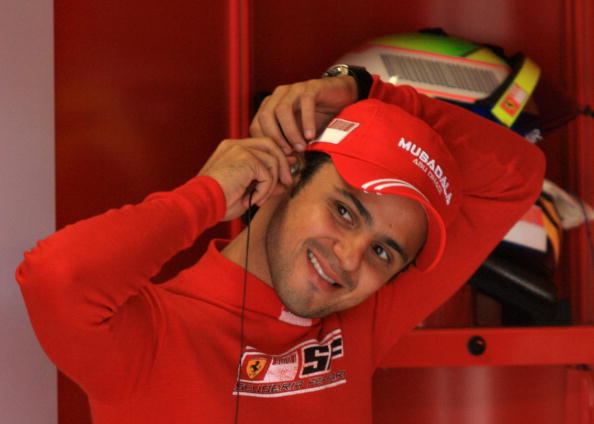 Ferrari's formula one driver Filipe Massa of Brasil adjust his earplugs on the last day of free tests at Monza F1 Circuit in Monza, 31 August 2007. AFP PHOTO / GIUSEPPE CACACE (Photo credit should read GIUSEPPE CACACE/AFP via Getty Images)
