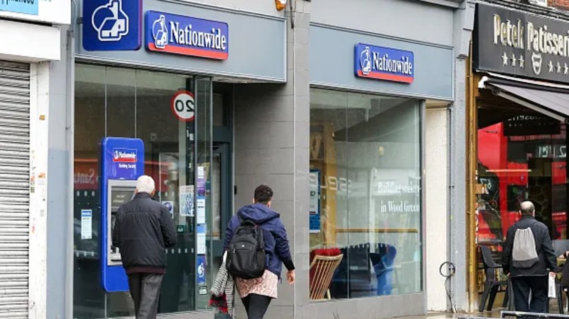 Nationwide building exterior with promotional banner highlighting £200 cash bonus for switching current accounts
