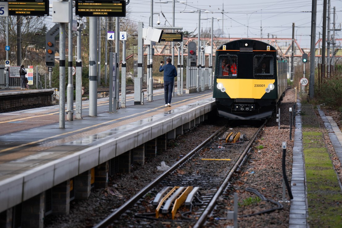 Train approaching West Ealing Station, London. If elected, Labour will pledge to renationalise the railways "without the taxpayer paying a penny in compensation costs". (Photo creditL James Manning/PA Wire)