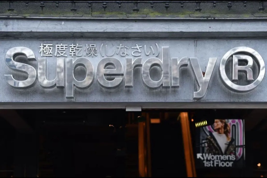 The Superdry logo on a store in Brussels