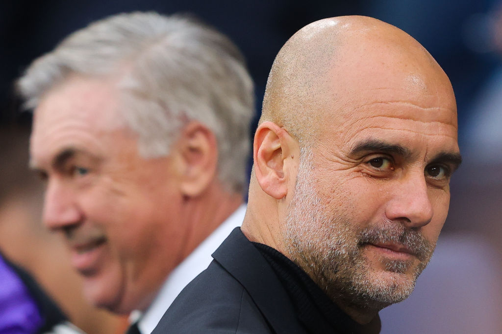 MANCHESTER, ENGLAND - MAY 17: Josep 'Pep' Guardiola, manager of Manchester City, looks on during the UEFA Champions League semi-final second leg match between Manchester City FC and Real Madrid at Etihad Stadium on May 17, 2023 in Manchester, England. (Photo by James Gill - Danehouse/Getty Images)