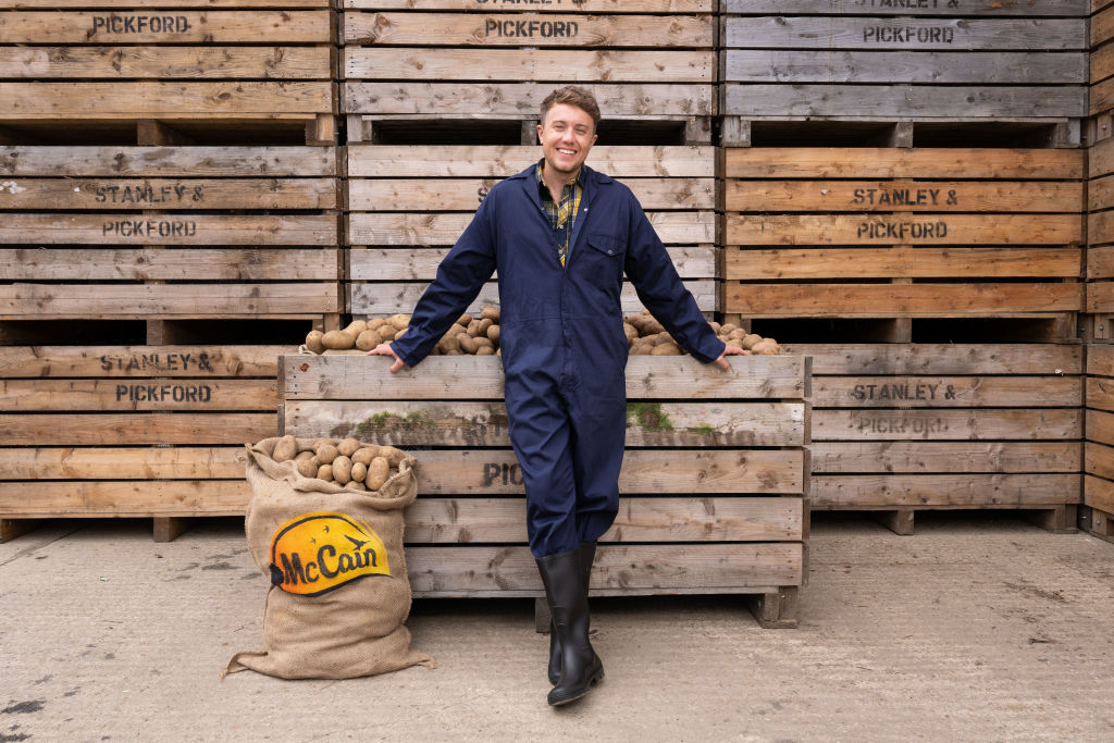 Roman Kemp poses at a McCain farm to launch the brand's new 