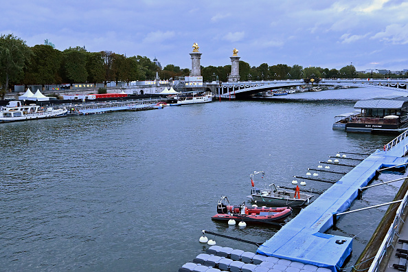 PARIS, FRANCE - AUGUST 06: A view of the pontoons setting in front of Alexandre III Bridge after the cancelation of the Open Water Swimming World Cup at River Seine on August 06, 2023 in Paris, France. Due to above average rainfall, the quality of the water of the Seine river was judged below average for the competition and the safety of the athletes. (Photo by Aurelien Meunier/Getty Images)