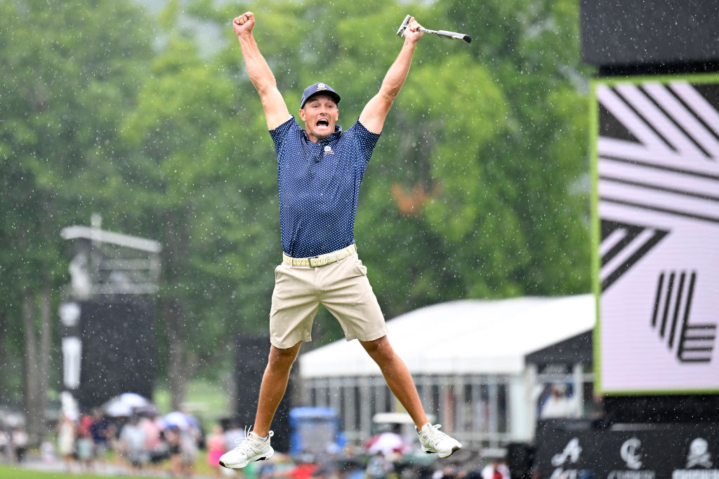 WHITE SULPHUR SPRINGS, WEST VIRGINIA - AUGUST 06: Bryson DeChambeau of the United States celebrates his birdie putt on the 18th hole with a record 58 to win the LIV Golf Invitational - Greenbrier at The Old White Course on August 06, 2023 in White Sulphur Springs, West Virginia. (Photo by Eakin Howard/Getty Images)