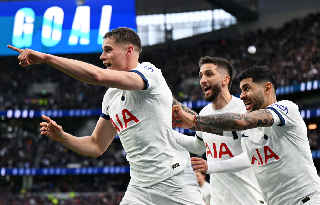 LONDON, ENGLAND - APRIL 07: Micky van de Ven of Tottenham Hotspur (L) celebrates scoring his team's second goal with teammates Rodrigo Bentancur and Cristian Romero during the Premier League match between Tottenham Hotspur and Nottingham Forest at Tottenham Hotspur Stadium on April 07, 2024 in London, England. (Photo by Mike Hewitt/Getty Images)