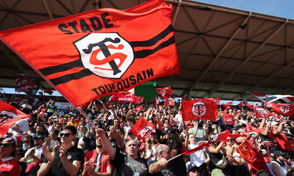 TOULOUSE, FRANCE - APRIL 14:  Toulouse supporters celebrate after their victory during the Investec Champions Cup Quarter Final match between Stade Toulousain and Exeter Chiefs at Stade Ernest Wallon on April 14, 2024 in Toulouse, France. (Photo by David Rogers/Getty Images)