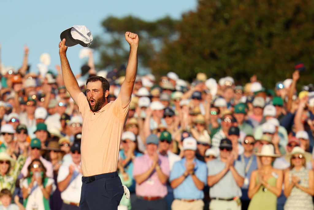 AUGUSTA, GEORGIA - APRIL 14: Scottie Scheffler of the United States celebrates on the 18th green after winning the 2024 Masters Tournament at Augusta National Golf Club on April 14, 2024 in Augusta, Georgia. (Photo by Andrew Redington/Getty Images)