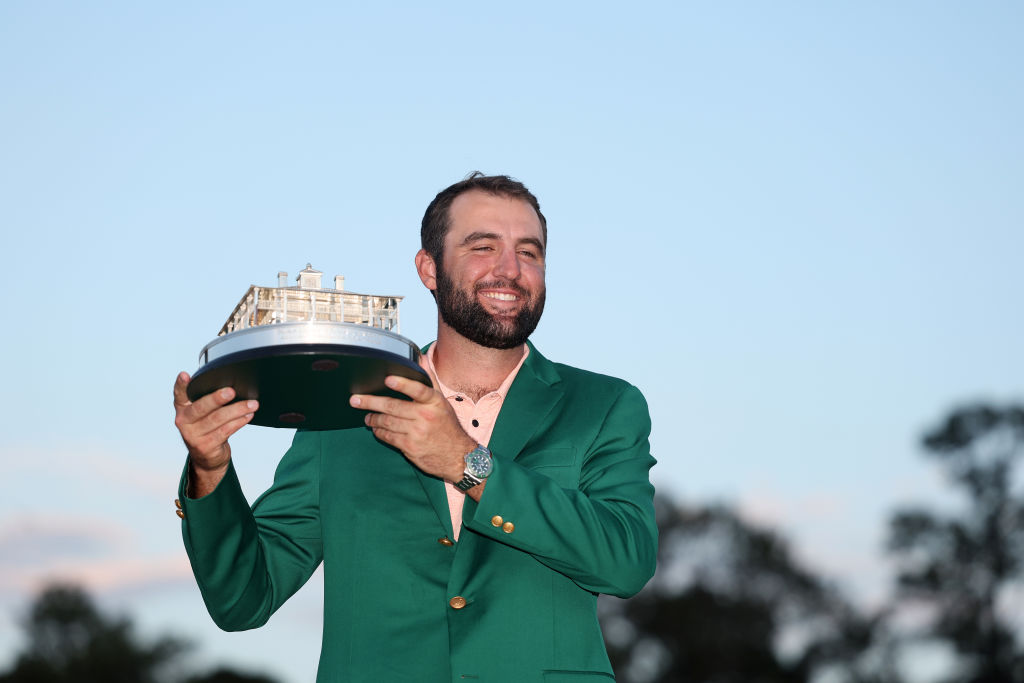 AUGUSTA, GEORGIA - APRIL 14: Scottie Scheffler of the United States poses with the Masters trophy after winning the 2024 Masters Tournament at Augusta National Golf Club on April 14, 2024 in Augusta, Georgia. (Photo by Warren Little/Getty Images)
