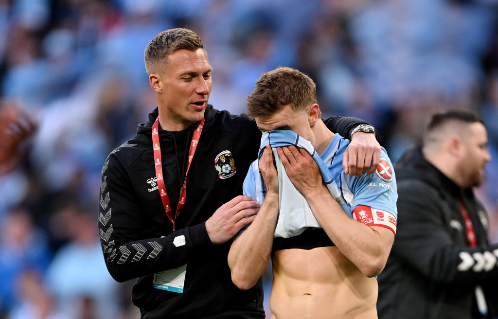 LONDON, ENGLAND - APRIL 21: Ben Sheaf of Coventry City looks dejected after the team's defeat in the penalty shootout during the Emirates FA Cup Semi Final match between Coventry City and Manchester United at Wembley Stadium on April 21, 2024 in London, England. (Photo by Mike Hewitt/Getty Images)