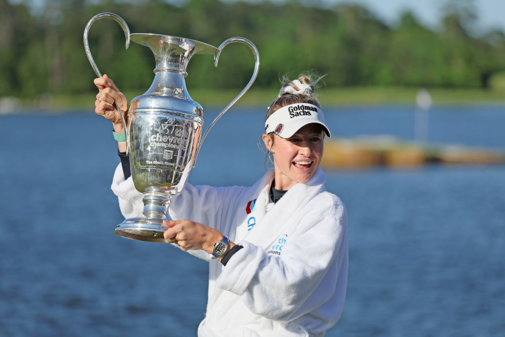 THE WOODLANDS, TEXAS - APRIL 21: Nelly Korda of the United States celebrates with the trophy after winning The Chevron Championship at The Club at Carlton Woods on April 21, 2024 in The Woodlands, Texas. (Photo by Andy Lyons/Getty Images)