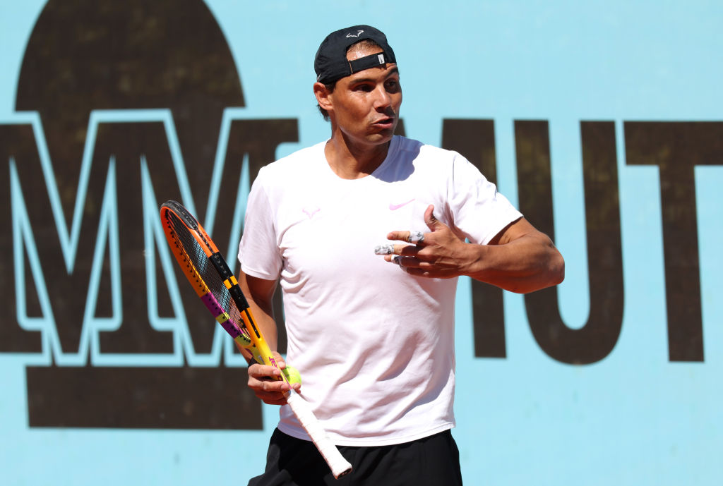 MADRID, SPAIN - APRIL 24: Rafael Nadal of Spain speaks to Coach, Carlos Moya during practice on Day Two of the Mutua Madrid Open at La Caja Magica on April 24, 2024 in Madrid, Spain.  (Photo by Clive Brunskill/Getty Images)