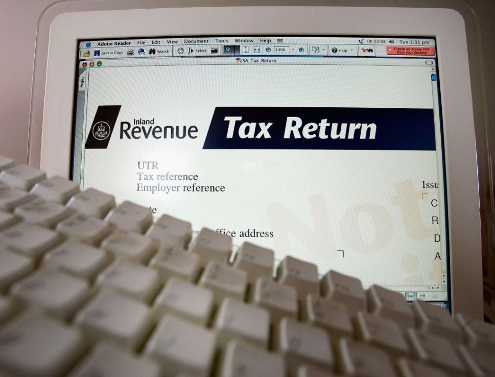 GLASGOW, UNITED KINGDOM - MARCH 15:  A UK Inland Revenue online self assessment Tax Return, March 14, 2005 in Glasgow Scotland. From April 2005, taxpayers with simple tax affairs - such as employees and pensioners - will receive a short tax return. The government is introducing mandatory electronic filing for businesses by 2010. (Photo illustration by Christopher Furlong/Getty Images)