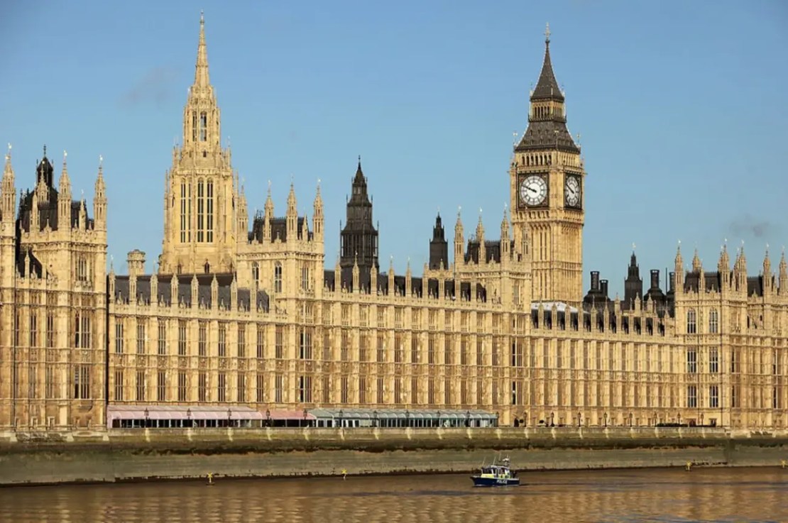 Two men have been charged with spying for China after an investigation by counter-terrorism police.