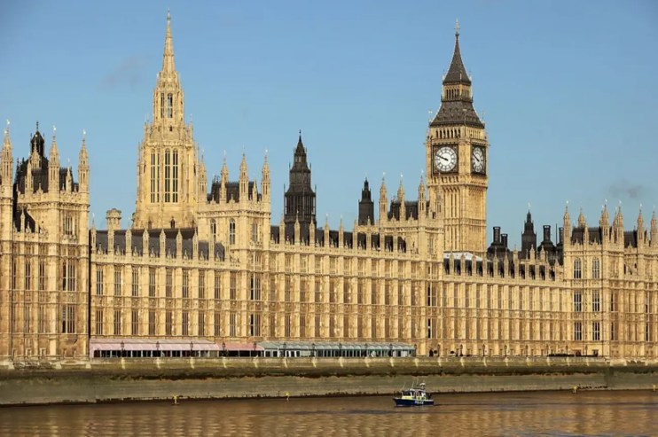 Two men have been charged with spying for China after an investigation by counter-terrorism police.