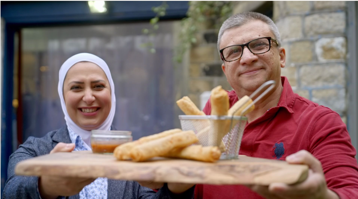 Razan Alsous and her husband Raghid Sandouk of Yorkshire Dama Cheese holding their famous 'Hello-Mi' rolls. 